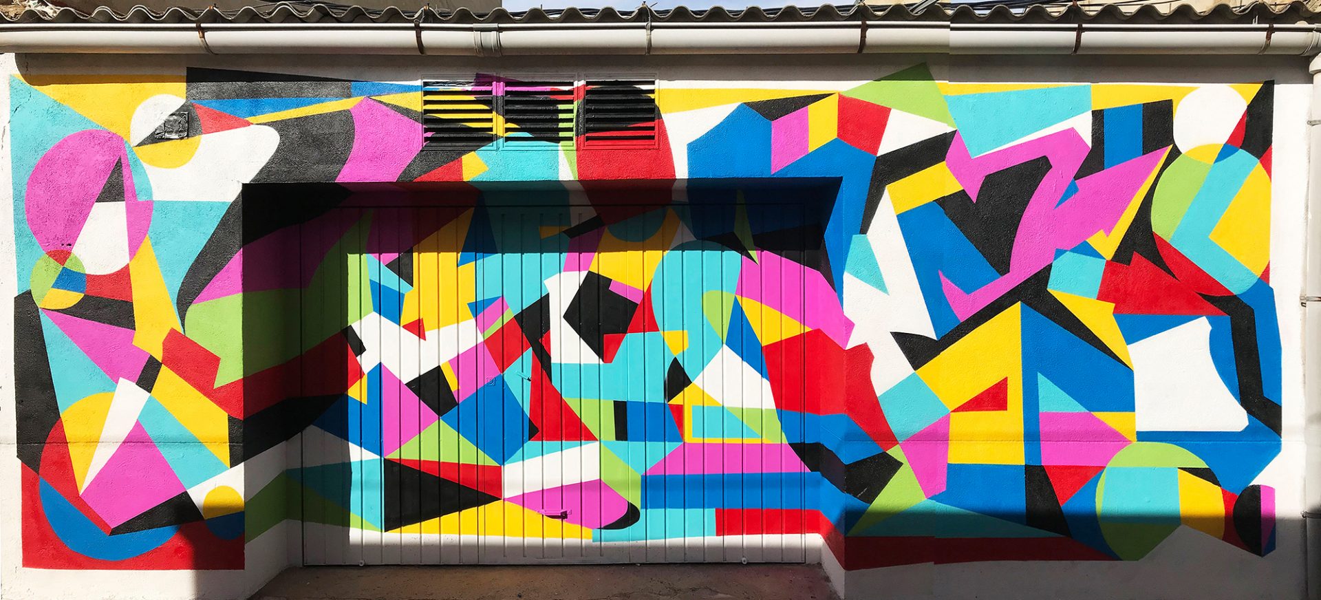 Hize mural in Spain combining graffiti and abstract shapes