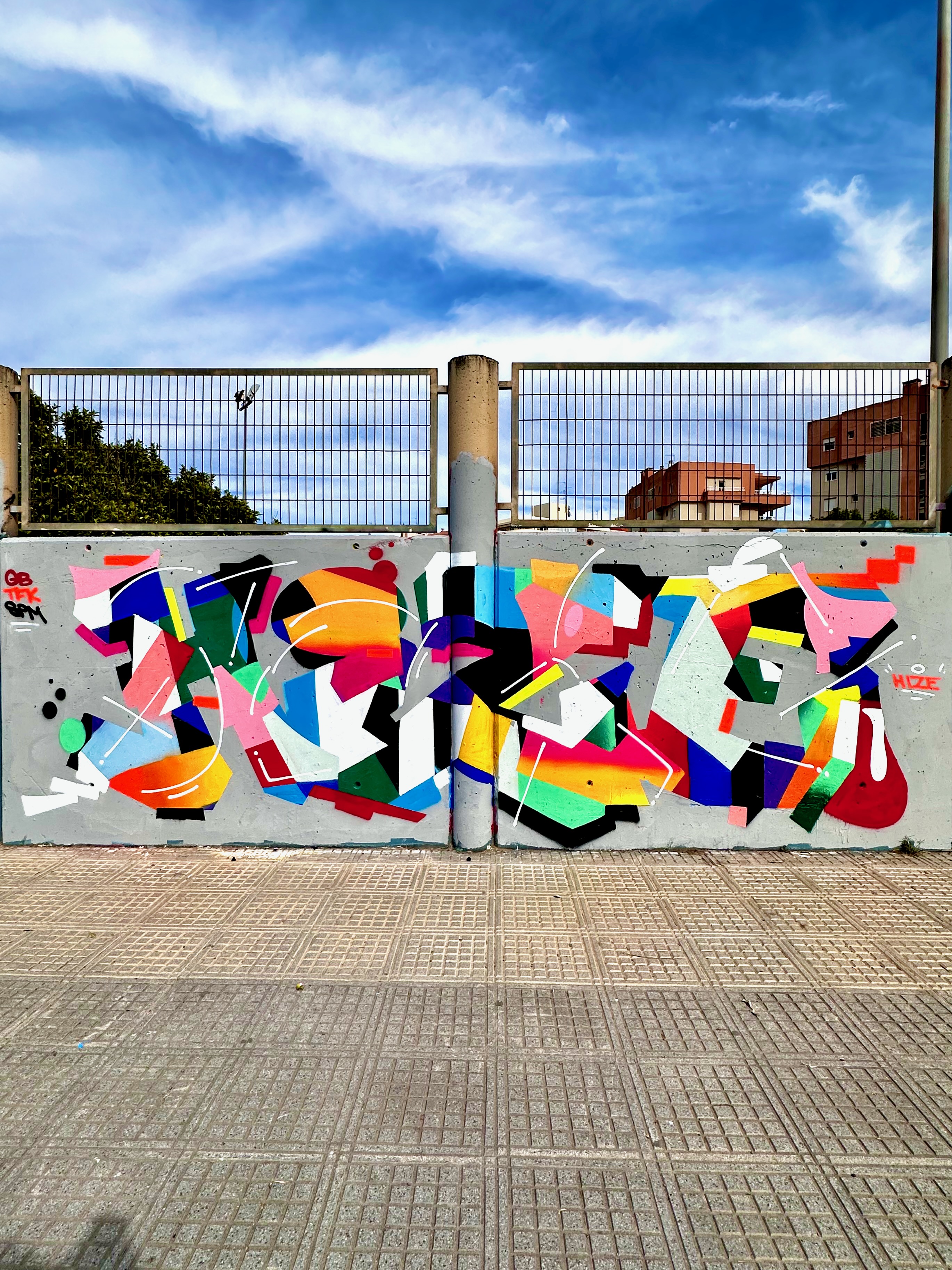 Hize abstract graffiti mural in a contemporary space