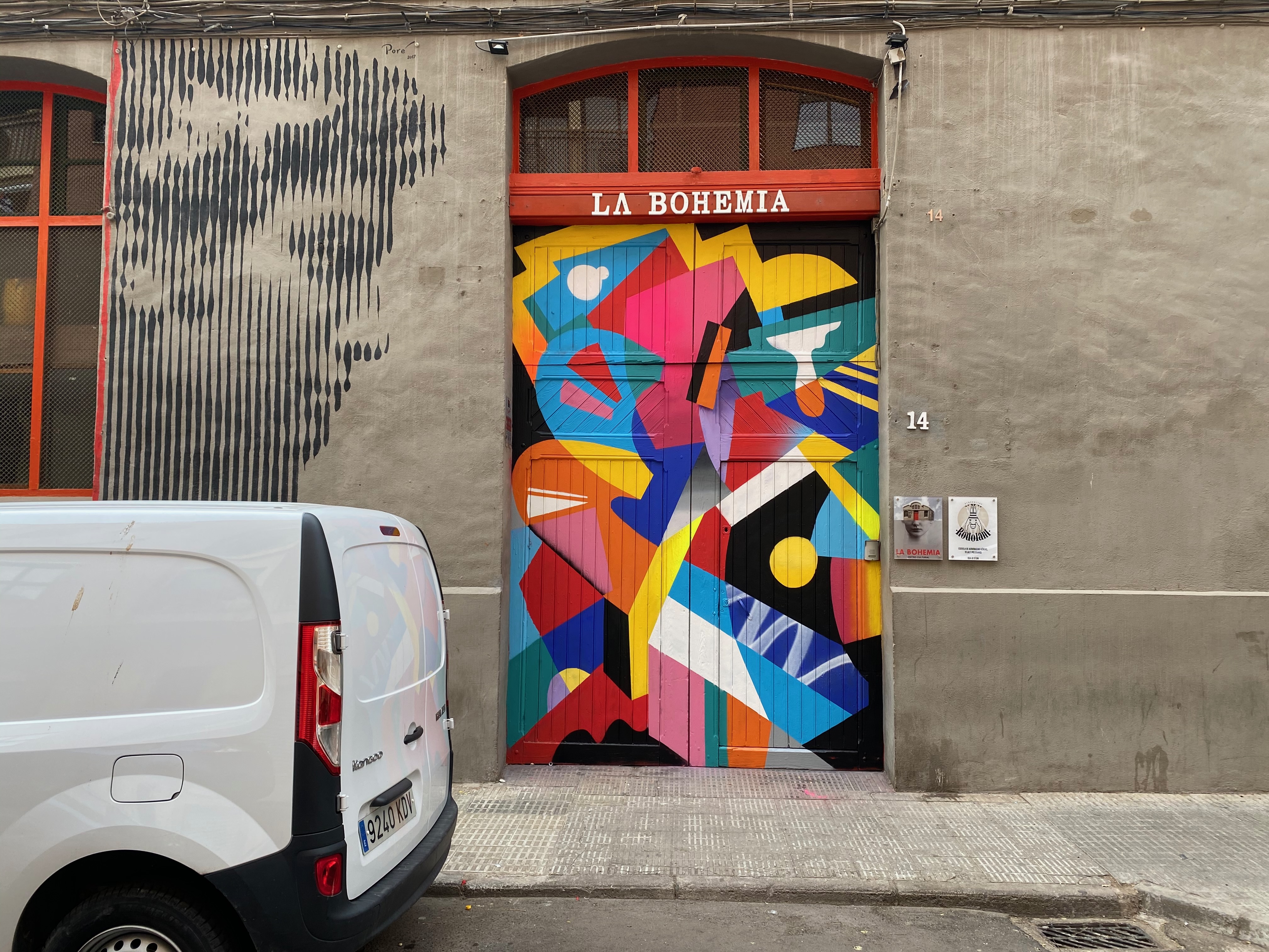 Hize abstract mural with colorful graffiti shapes in an interior space